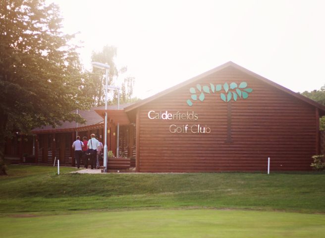 golfers at cabins